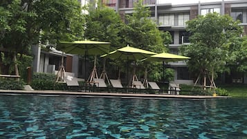 Outdoor pool, pool umbrellas, sun loungers