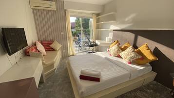 Studio | Desk, bed sheets