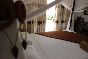 Kamar Double Deluks, kamar mandi pribadi | Seprai premium, brankas, dan didekorasi berbeda-beda