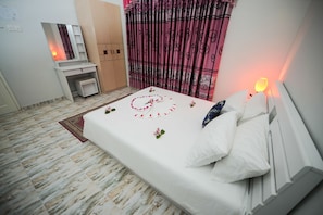 Double Room, Non Smoking, Partial Sea View | Minibar, iron/ironing board, rollaway beds, free WiFi