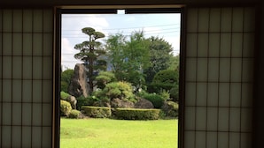 A traditional Japanese room with tatami flooring and shoji screens. - Togawaso (Fujikawaguchiko)