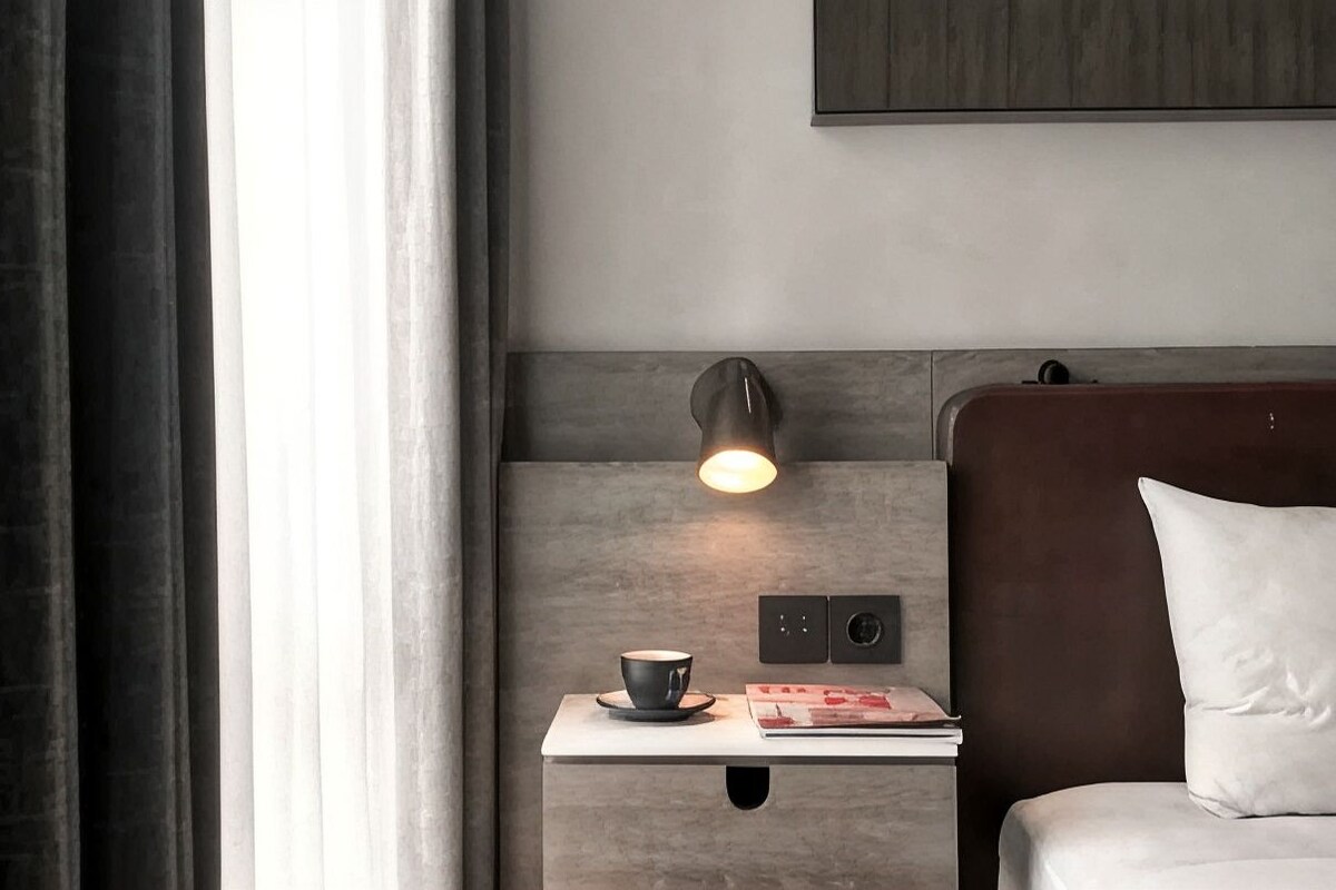 Blackout drapes, soundproofing, iron/ironing board (on request)