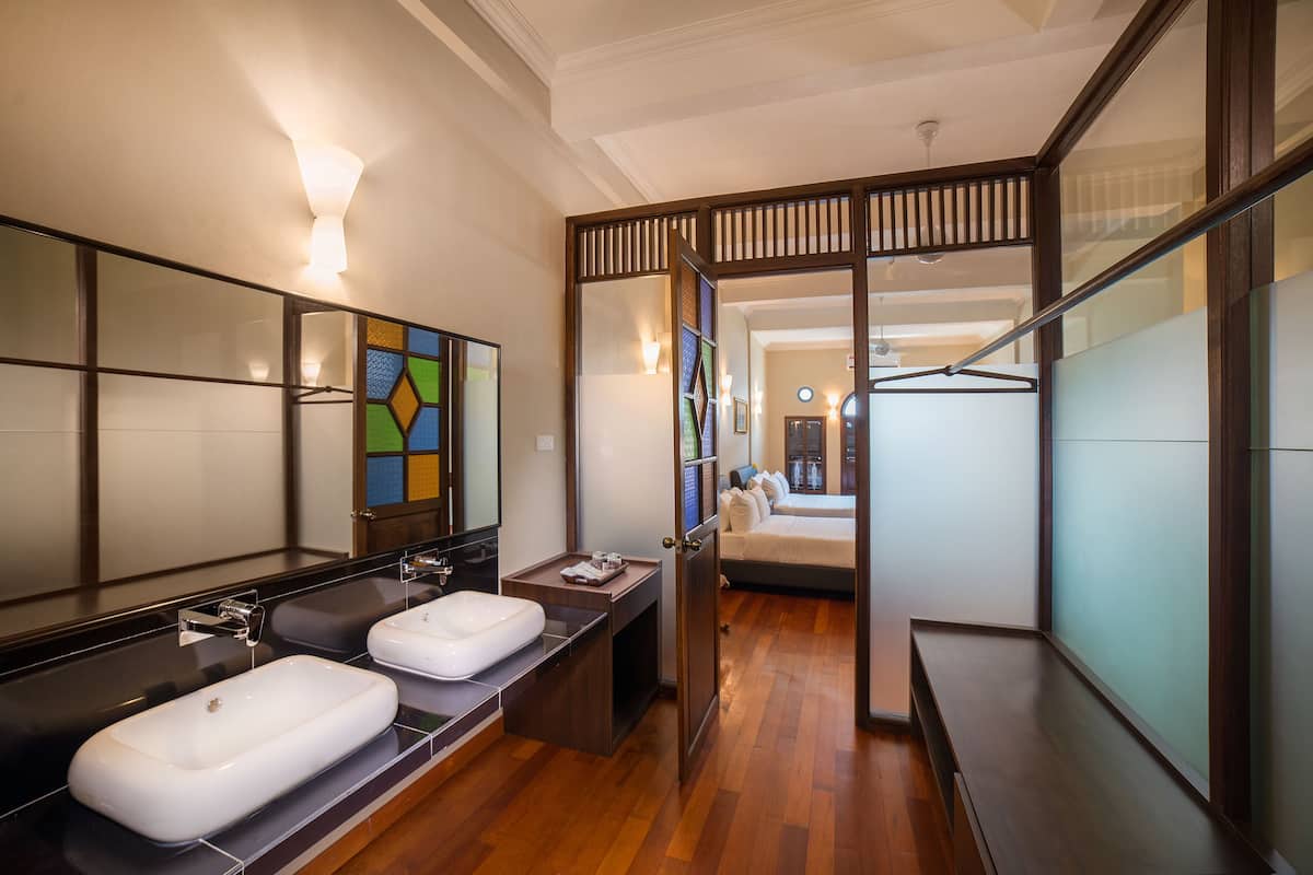 family suite | bathroom | shower, rainfall showerhead, free toiletries, hair dryer