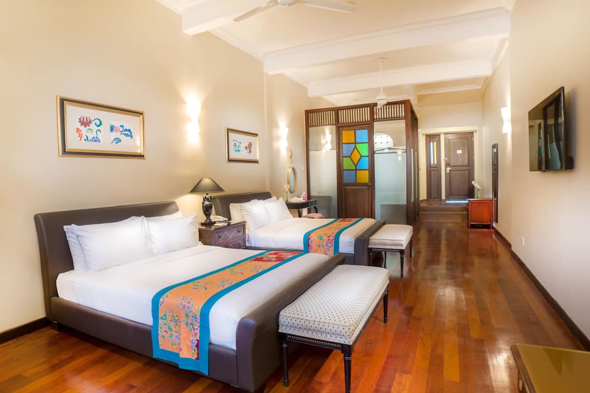 family suite | 1 bedroom, minibar, in-room safe, desk
