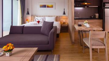 Luxury Suite Double Room | Living area | 40-inch LCD TV with satellite channels, TV, DVD player