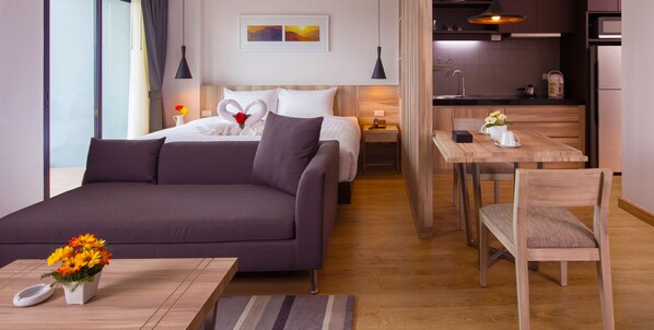 Luxury Suite Double Room | Living area | 40-inch LCD TV with satellite channels, TV, DVD player