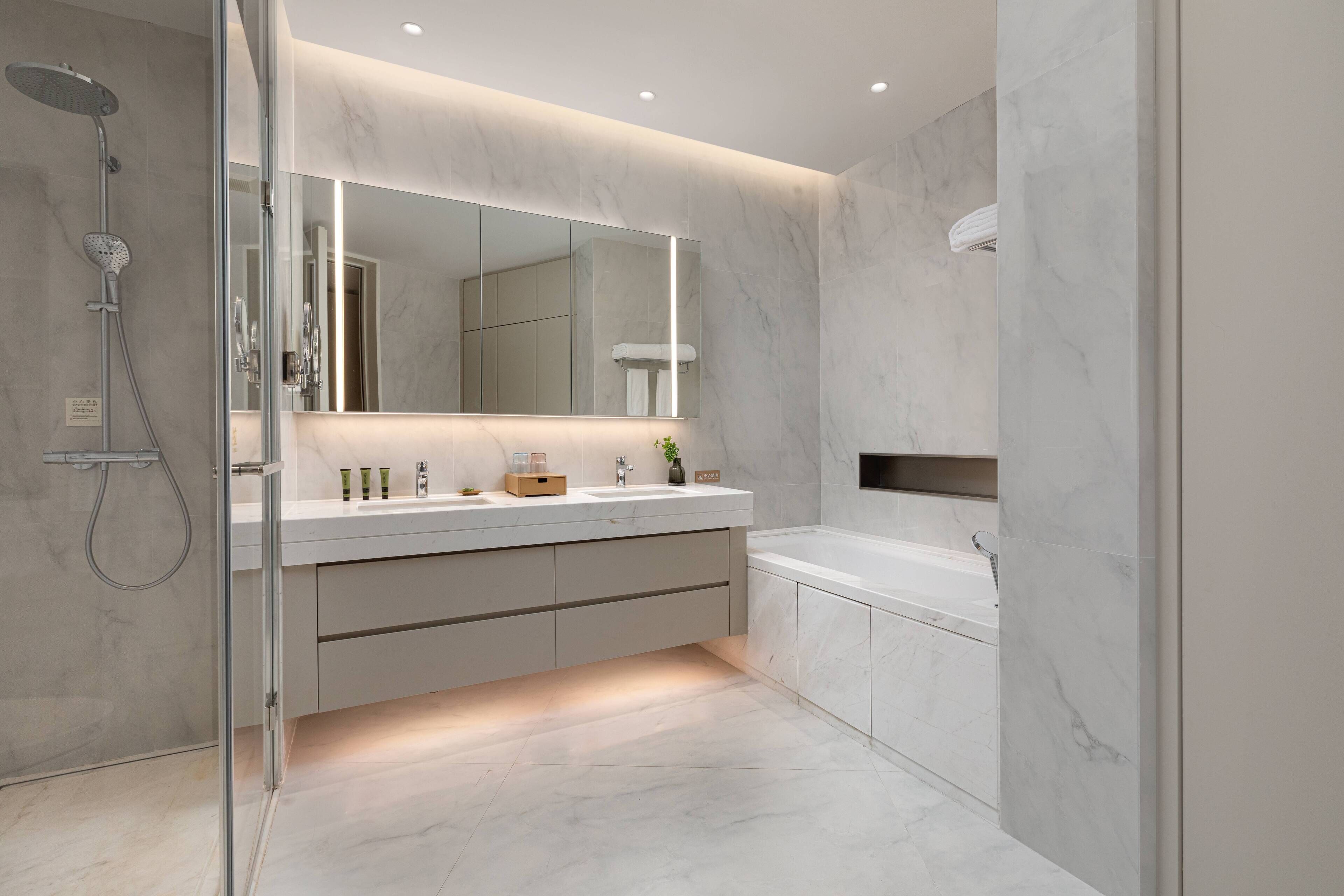 3 bedroom premier | bathroom | combined shower/bathtub, designer toiletries, hair dryer, slippers