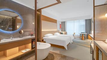 Premium bedding, free minibar, in-room safe, desk