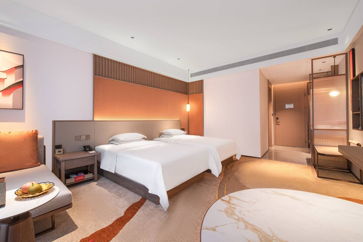 SuperiorTwin Gardenview | Premium bedding, minibar (free items), in-room safe, desk