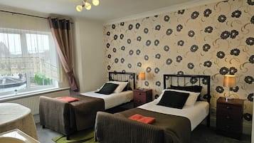 Basic Twin Room, 2 Single Beds, Ensuite (2 singles beds - 106) | Individually decorated, individually furnished, desk, laptop workspace