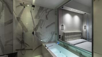 Luxury Suite, 1 King Bed, Private Bathroom, City View | Bathroom | Combined shower/tub, rainfall showerhead, free toiletries, hair dryer