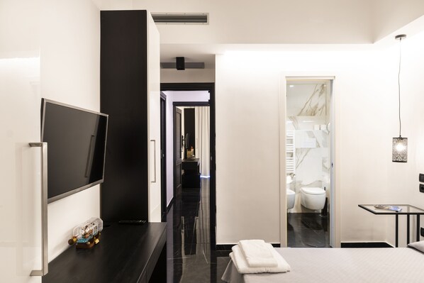 1 dormitorio, ropa de cama de alta calidad, caja fuerte y escritorio