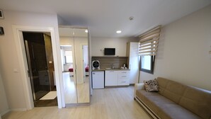 ファミリー 4 人部屋 | 高級寝具、ミニバー、遮光 カーテン、防音設備