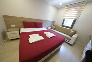 Ropa de cama de alta calidad, minibar y cortinas blackout