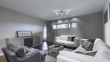 Superior Villa, 4 Bedrooms, Sauna, Lake View (Villa Karppi) | Living area | Flat-screen TV, heated floors