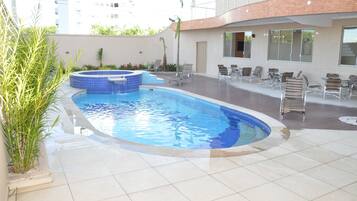 Outdoor pool, pool umbrellas, pool loungers