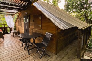 Panoramic Bungalow, 1 Bedroom, Private Bathroom, Mountain View | 1 bedroom, individually decorated, individually furnished, bed sheets - Hacienda Tres Casitas (Cabo Rojo)