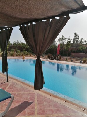 2 outdoor pools, an infinity pool, free pool cabanas, pool umbrellas