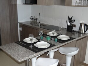 Apartment, 2 Bedrooms | Private kitchenette | Full-sized fridge, microwave, oven, stovetop