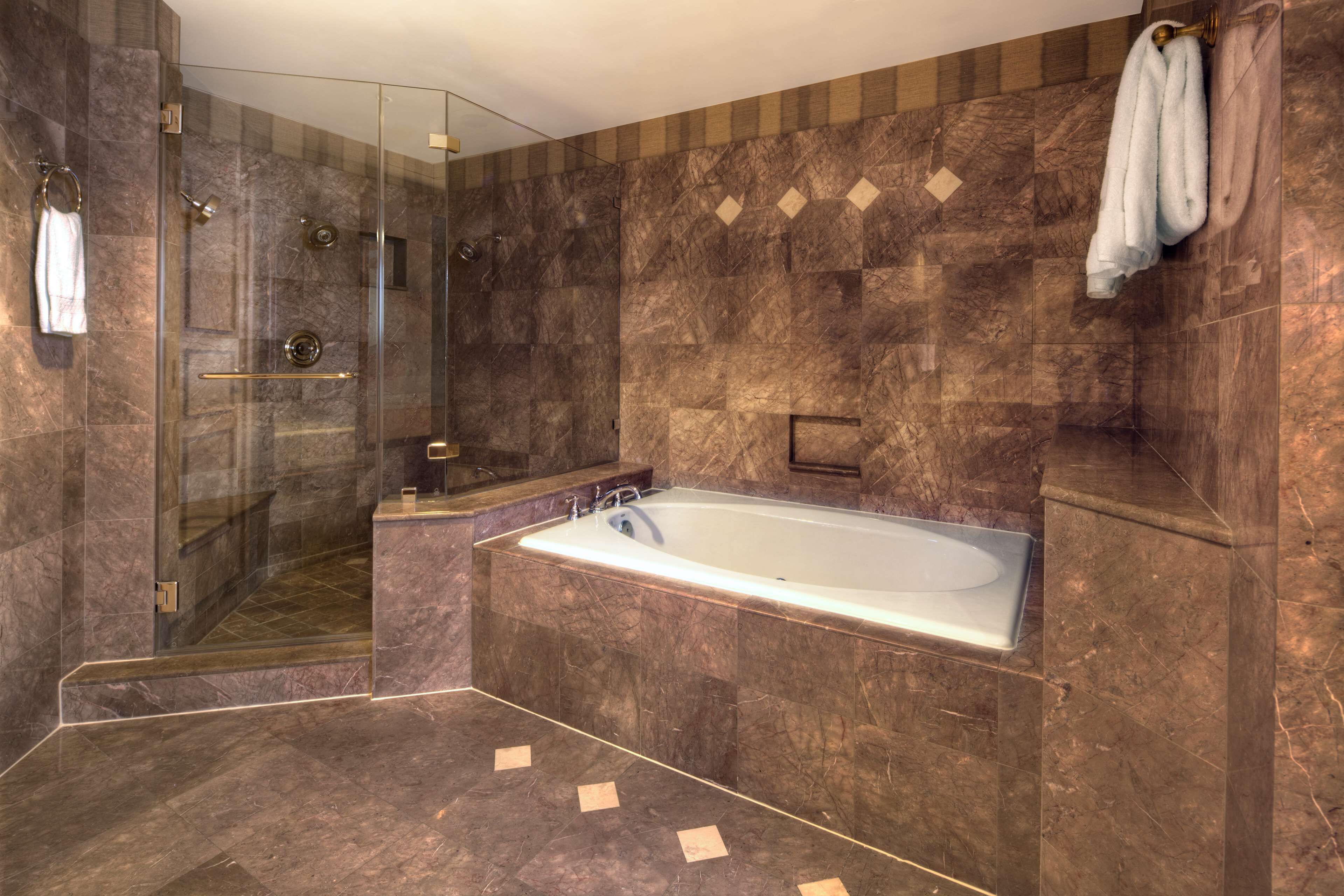 presidential suite, 1 king bed | bathroom | combined shower/bathtub, free toiletries, hair dryer, towels
