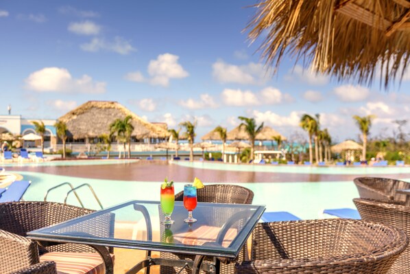 Outdoor pool, free cabanas, pool umbrellas