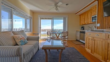 Two Bedroom Apartment 132 | Living area | 42-inch flat-screen TV with cable channels, TV