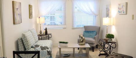 Deluxe Apartment, 1 King Bed, Terrace, Garden Area | Living room | Flat-screen TV