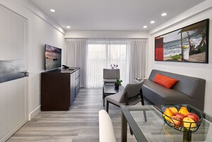 Two Bedroom Penthouse Loft Suite with Balcony and Kitchenette | Living area | 40-inch Smart TV with cable channels, TV