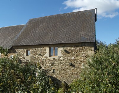 Relax in the beautiful Normandy countryside in an ancient converted barn.