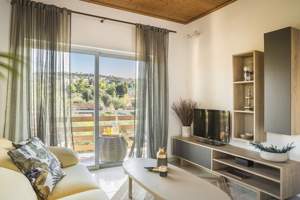 Superior Apartment, 2 Bedrooms, Terrace | Living area | 42-inch Smart TV with cable channels, TV