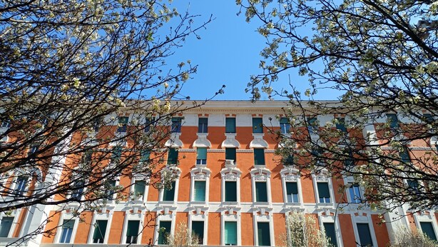 A multi-story building with a symmetrical facade, large windows, and a central entrance. - Downtown Rome, Vatican - St. Peter's area.  Elegant 3-bedroom, 2-bathroom apartment (Roma)