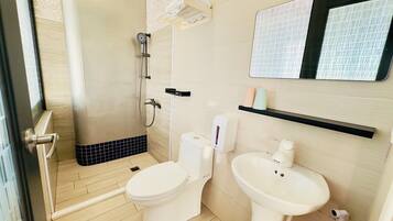 Shower, free toiletries, hair dryer, slippers