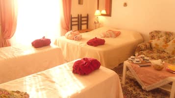 1 slaapkamer, een strijkplank/strijkijzer, beddengoed