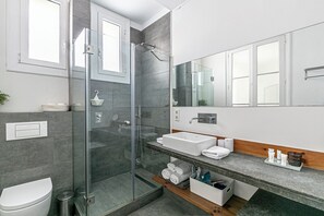Bathtub, hair dryer, towels, soap