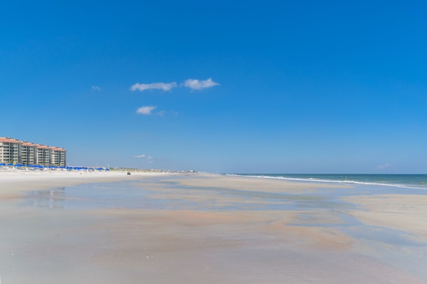 On the beach, sun loungers, beach towels