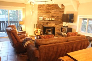 Smart TV, chimenea, reproductor de DVD y tenis de mesa 
