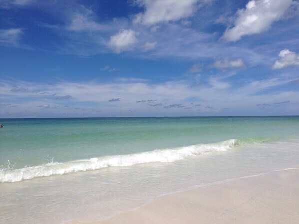 On the beach, sun loungers, beach towels