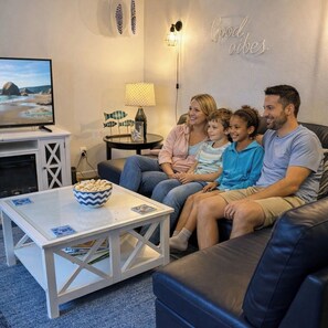 Smart TV, fireplace, DVD player, books