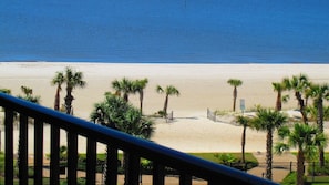 On the beach, sun-loungers