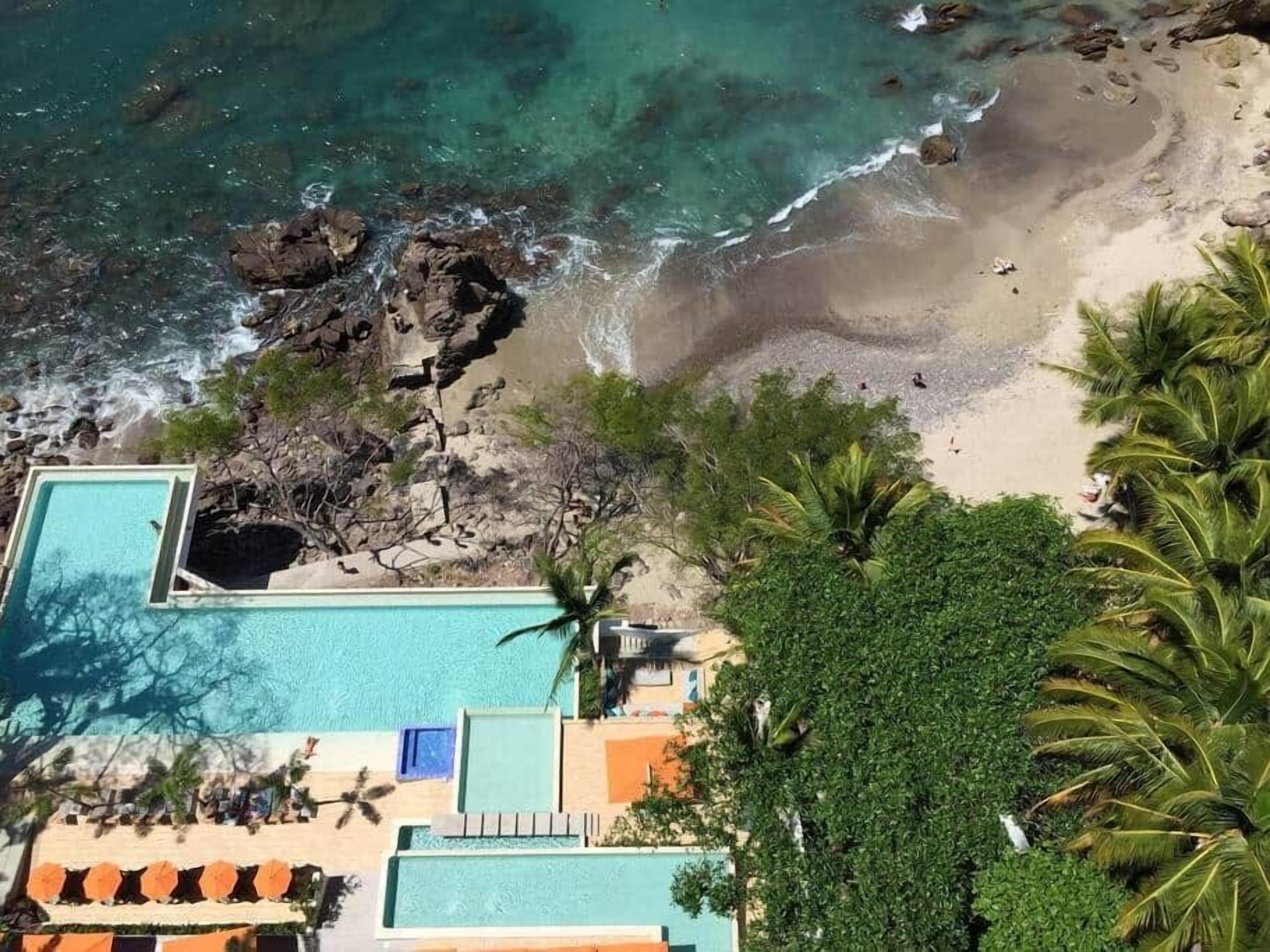 On the beach, sun loungers, beach towels