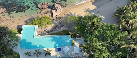 On the beach, sun-loungers, beach towels