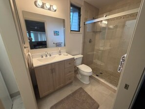 Combined shower/tub, hair dryer, towels, soap