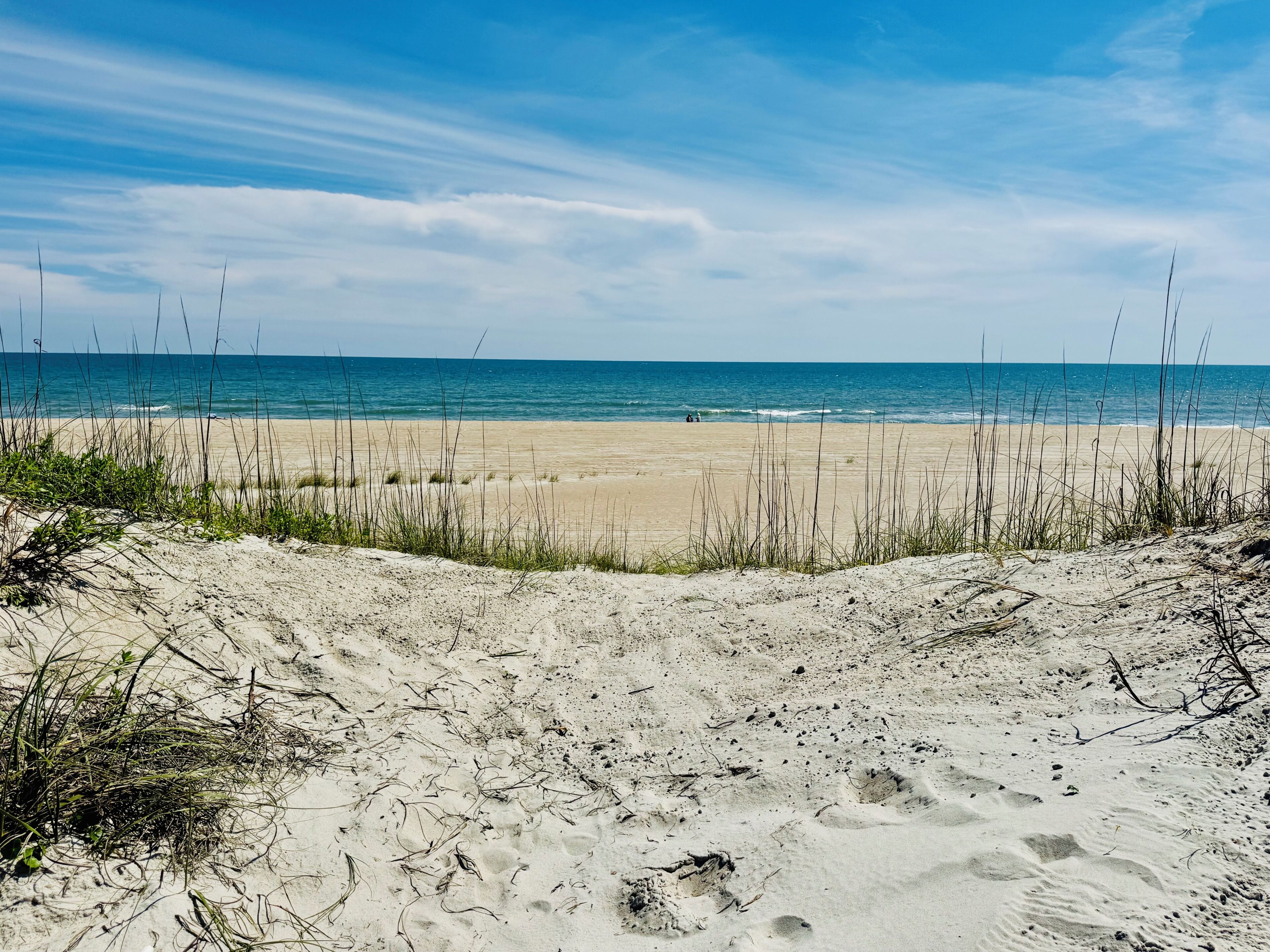 On the beach, sun loungers, beach towels