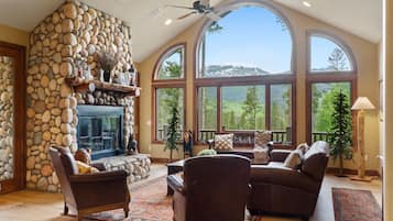Smart TV, fireplace, foosball, books