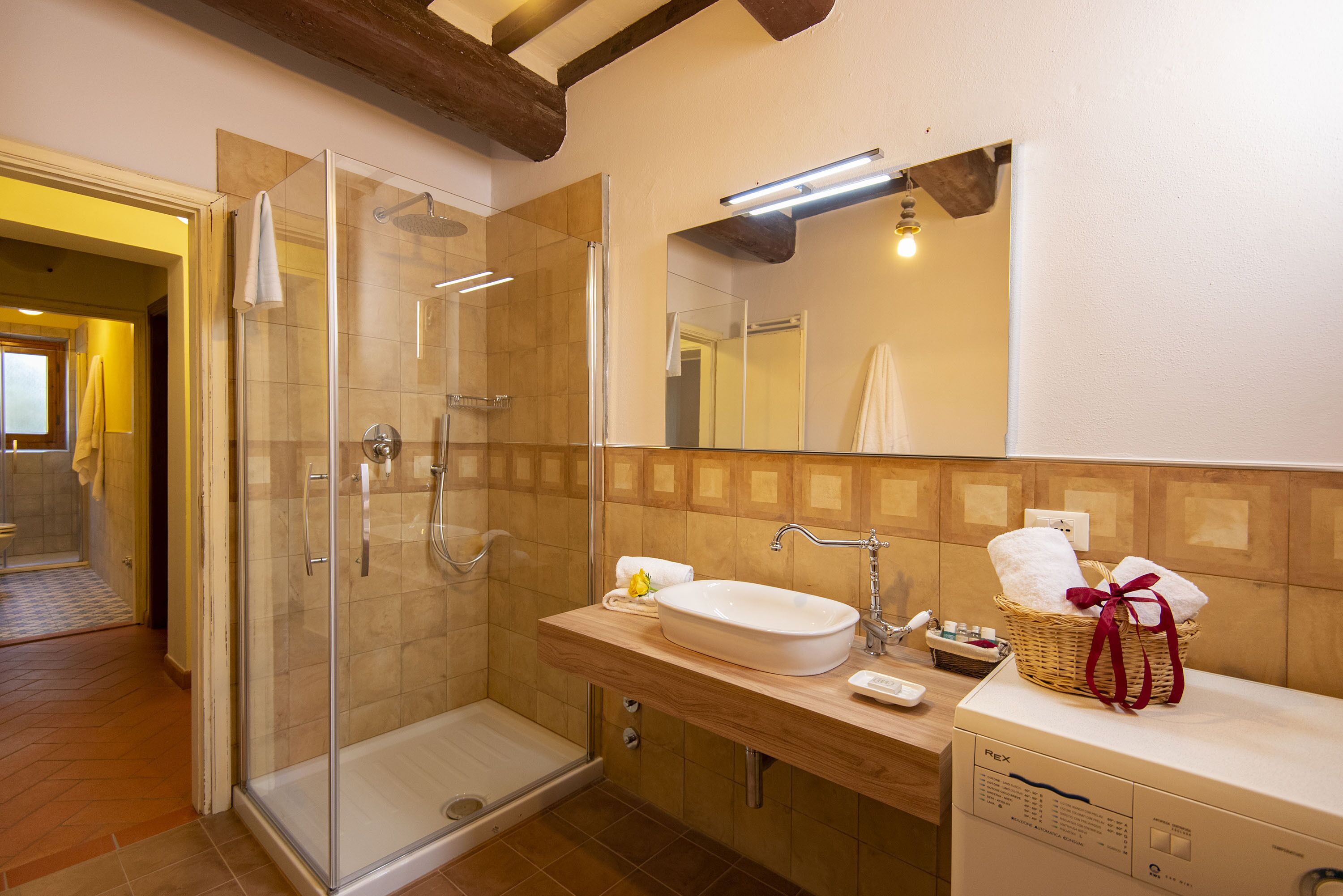 Bathtub, hair dryer, bidet, towels