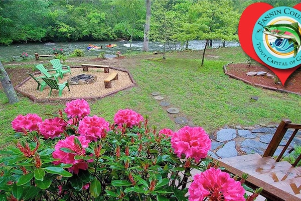 Looking off front porch swing! Notice river in front yard! 
Trout Capital of  GA