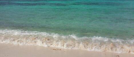 On the beach, sun-loungers, beach towels