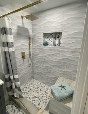Shower, eco-friendly toiletries, hair dryer, towels