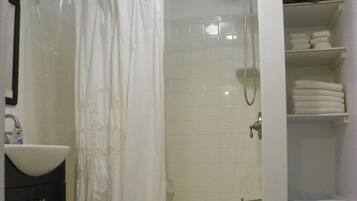 Hair dryer, towels, soap, shampoo