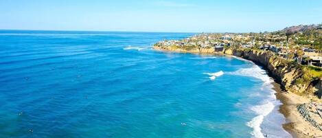 Platja a a prop, gandules de platja i tovalloles de platja